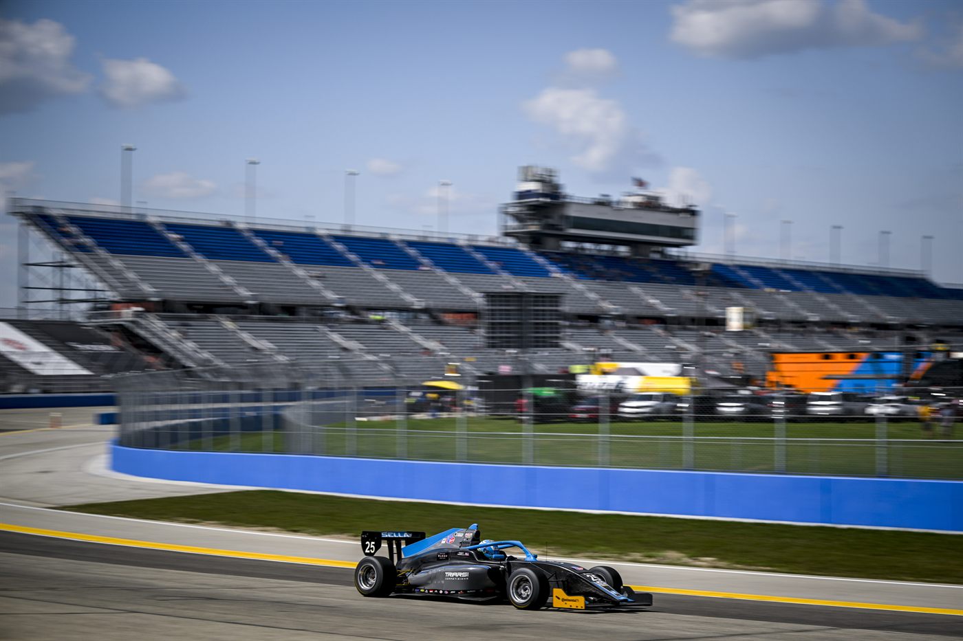 Musella running on the Milwaukee Mile oval.